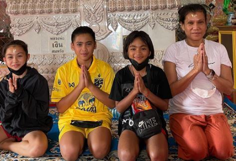 Kaz Crossley mother with the kids of Thailand for a charity event.